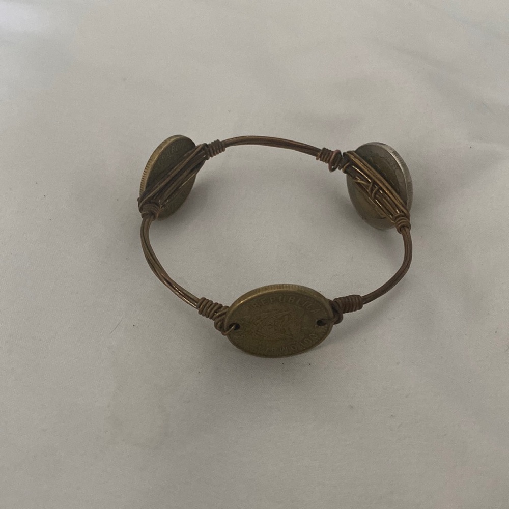 Woman’s gold coin bracelet